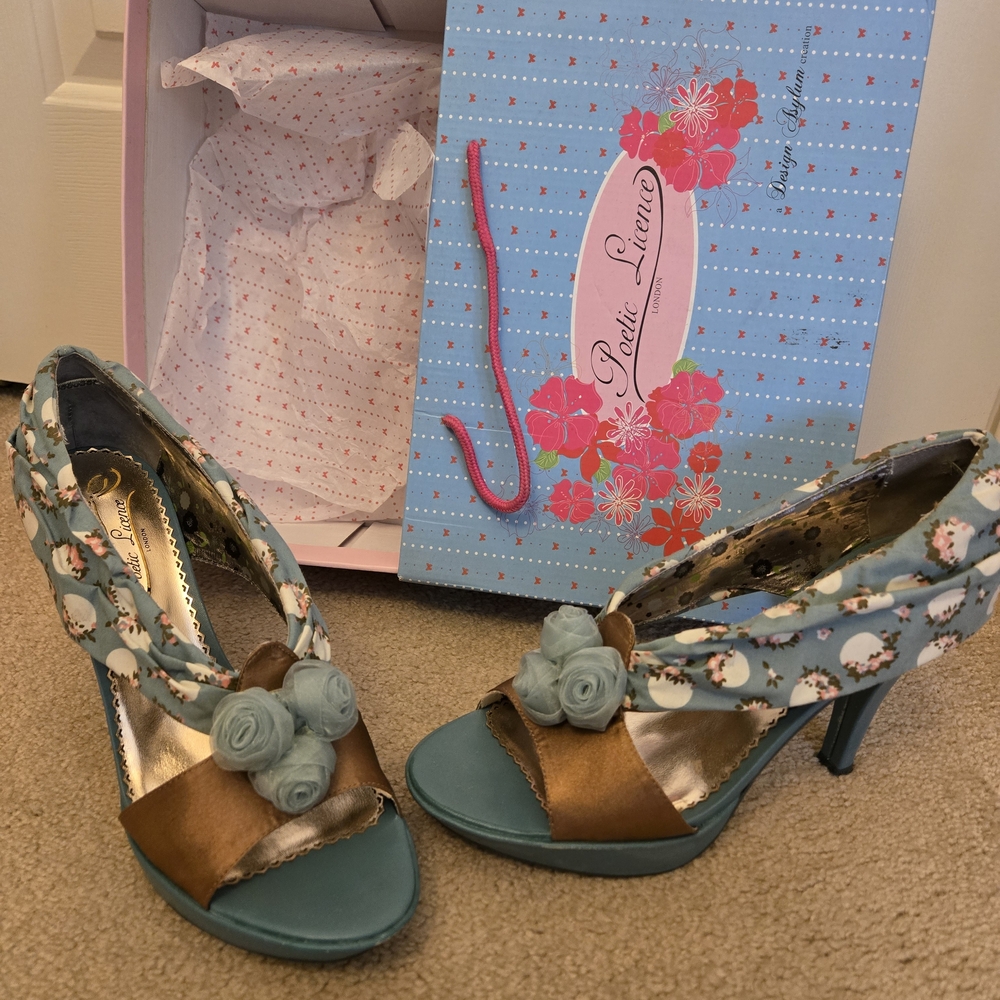 Poetic License Blue and Gold Heels with Elegant Design